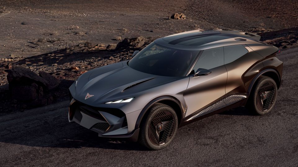 A gray SUV concept car on a dark road.