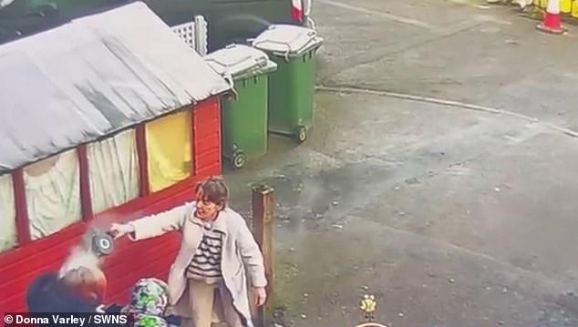Ina Priestly is seen pouring water over her neighbour Susan Varley in a horrific video