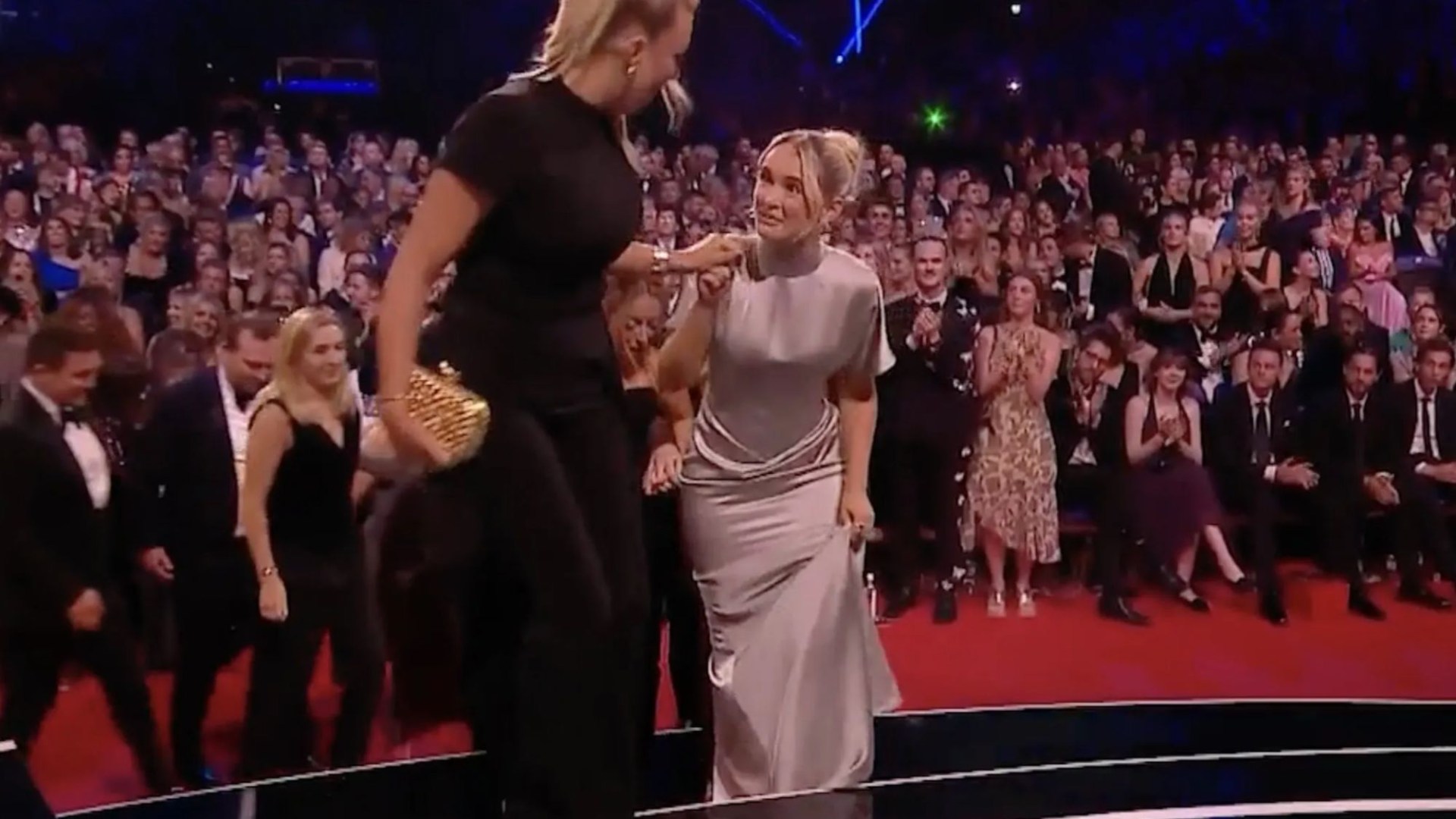 Watch the blink and you'll miss it moment Molly-Mae Hague loses her shoe as she wins first NTA