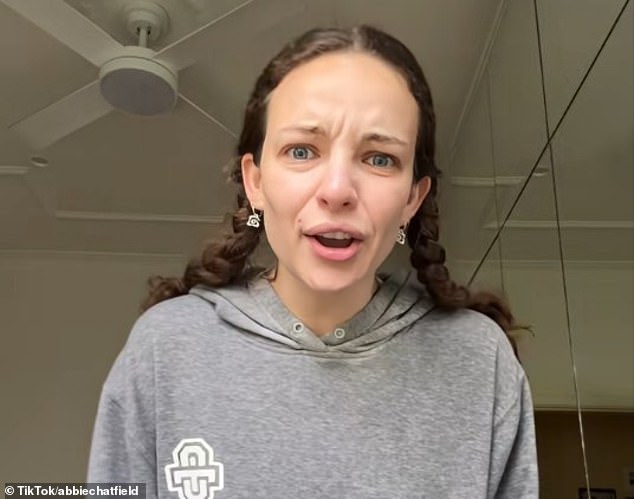 Former reality TV star Abbie Chatfield (pictured) said she 'hated' Kirk, before using his death to make a grim political prediction about how both political sides will become more violent