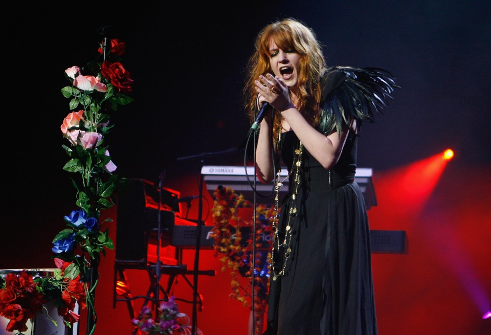 Florence Welch of Florence + The Machine performing live on stage.