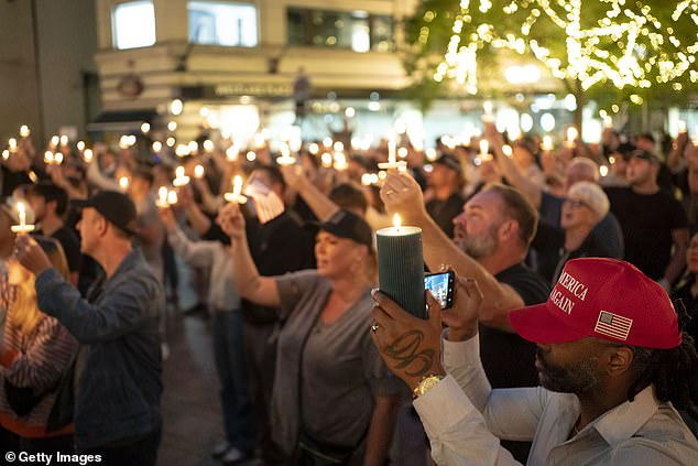 A vigil is held in memory of Charlie Kirk at Seattle, Washington