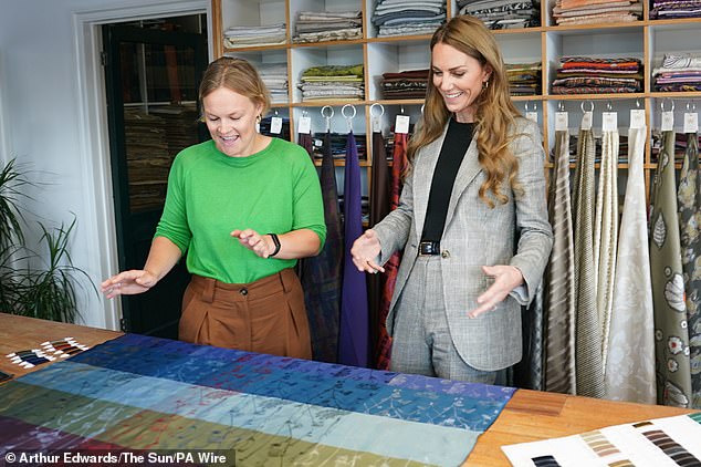 Kate, pictured, looked impressed as she took in the fabrics and textiles at the manufacturers today