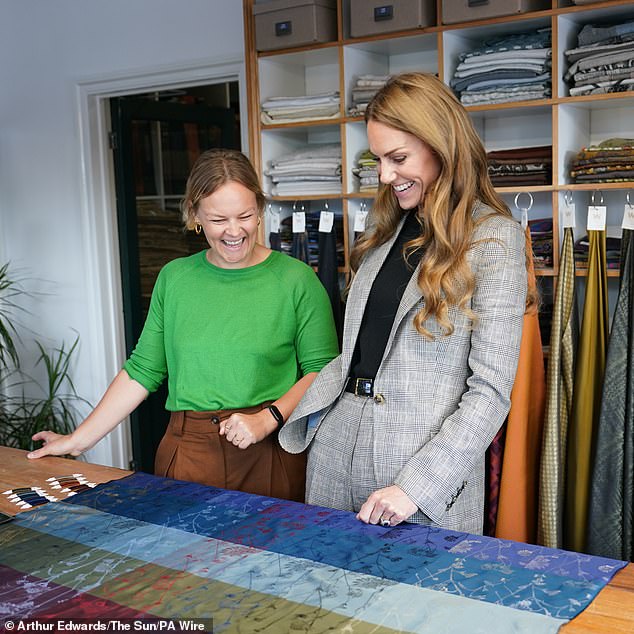 The royal looked to be in high spirits as she got to take a look at the materials on display this afternoon