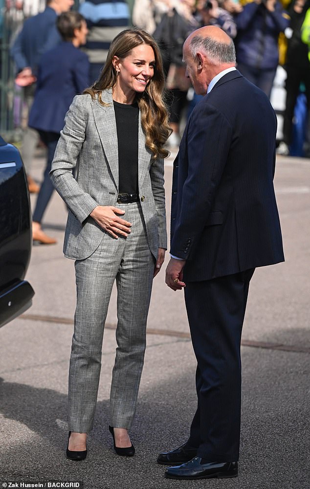 Kate opted for a stylish suit - accessorised with a leather belt - for the occasion in Suffolk this mornig