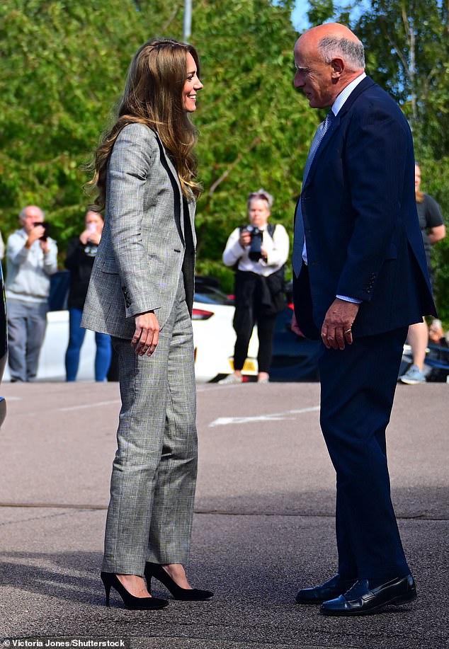 Smiling Kate looked to be enjoying the conversation as she was greeted for her visit to Sudbury Silk Mills