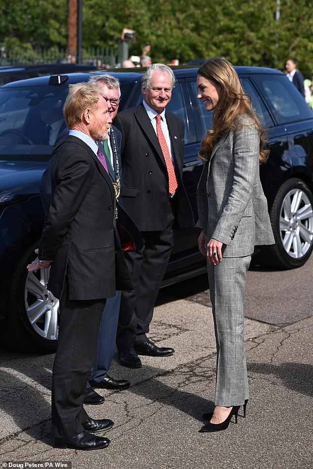 The royal was in high spirits as she spoke with others at the family-run weaving mill in Sudbury today