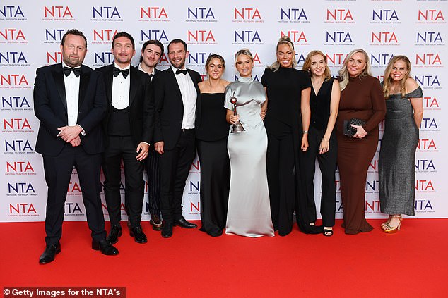 Molly-Mae and her team posed with her on the red carpet