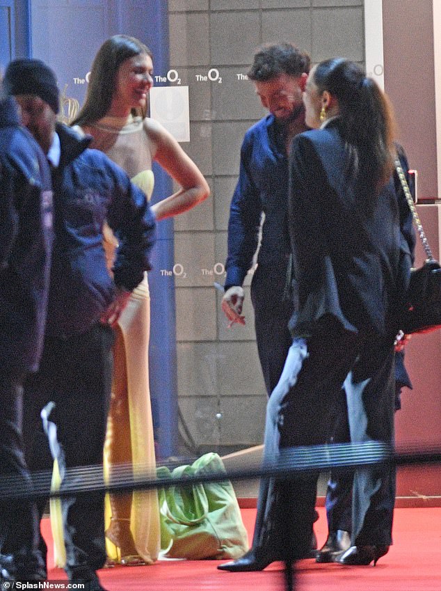 Sam enjoyed another reunion with his ex Samie Elishi as they snuck out for a cigarette during the National Television Awards