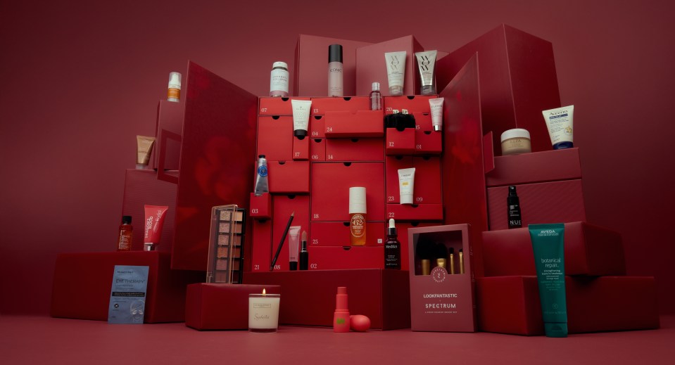 Beauty advent calendar with various cosmetics and beauty products.