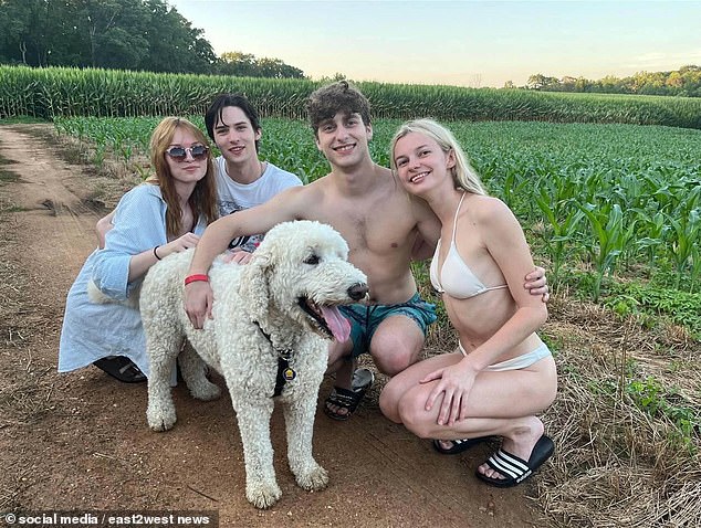 In happier times, photos from a lakeside getaway posted by her uncle Scott Haskell capture the pair smiling with Iryna’s loved ones and their dog