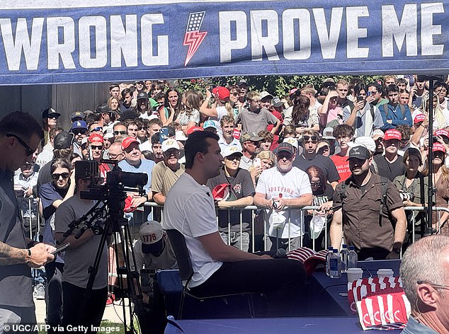 Kirk was seen sitting in a gazebo on campus and taking questions from the 3,000-person crowd before he was shot and killed