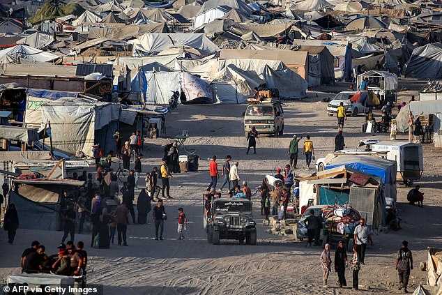 Displaced people's tents erected along the waterfront in Gaza City are pictured on September 2, 2025