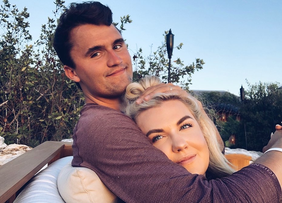 Charlie Kirk and Erika Frantzve embracing.
