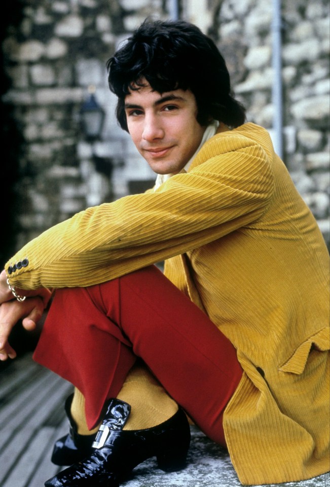 Cat Stevens in a yellow corduroy jacket and red pants in the 1960s.