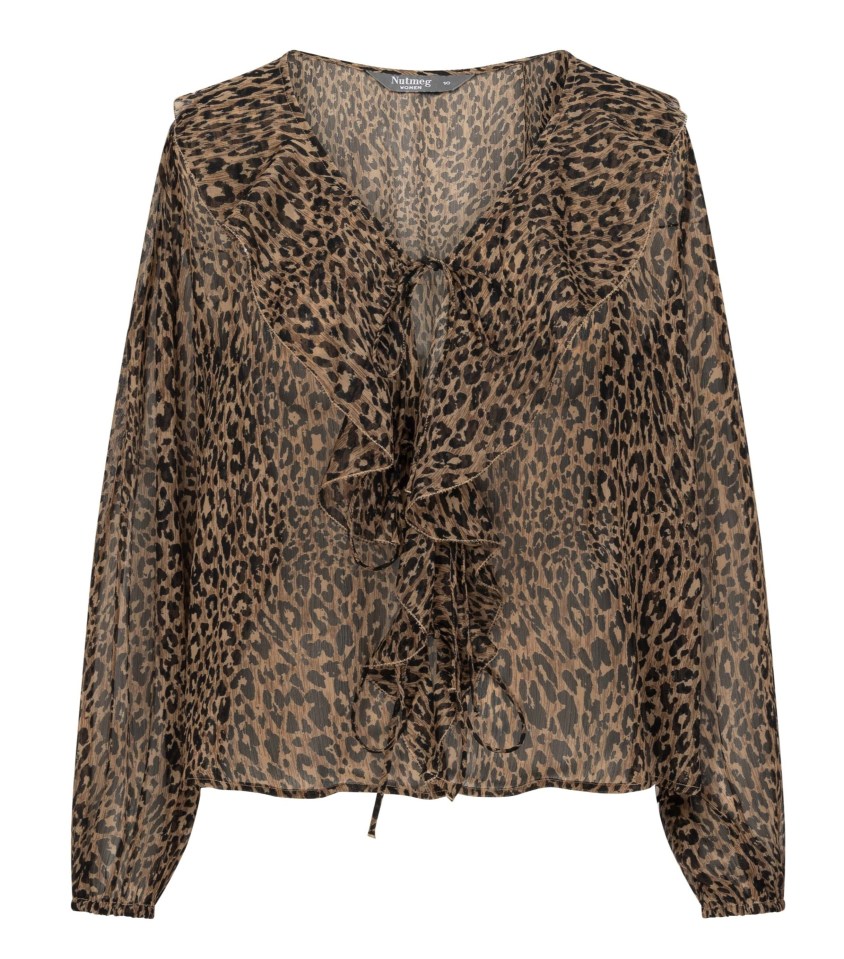 Leopard print blouse with ruffled neckline and tie.