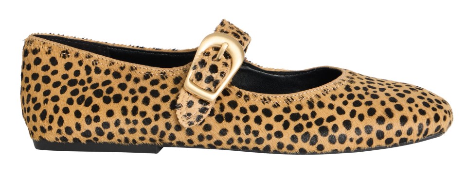Tan and black spotted flats with a gold buckle.