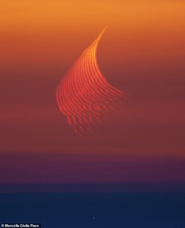 Marcella Giulia Pace, from Italy, won the Our Moon category. This image captures the phenomenon of atmospheric refraction, where moonlight passes through dense layers of Earth's atmosphere near the horizon, bending in a manner similar to light rays through a prism