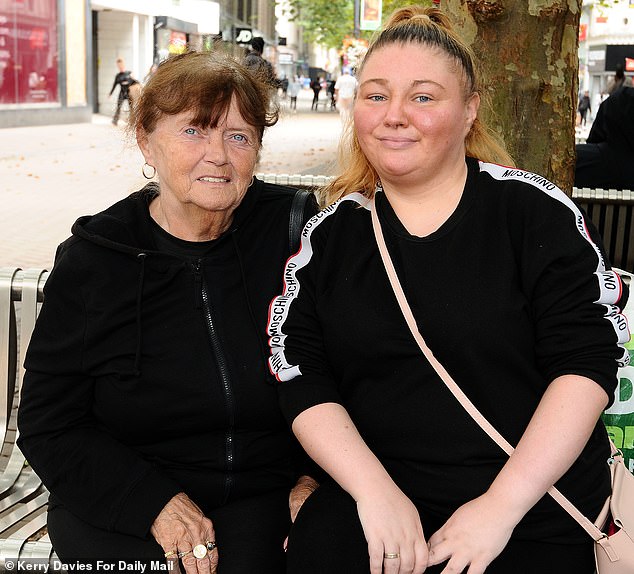 Myra and her 31-year-old granddaughter Georgina. Things have become so bad that Myra admits keeping a foot-long wooden truncheon hanging beside her front door