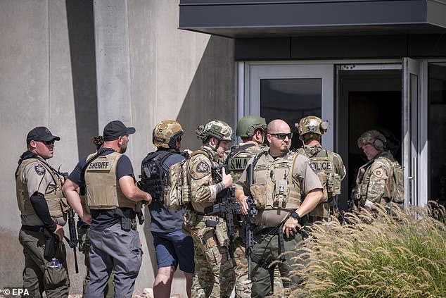 Armed officials were deployed in the aftermath of the shooting