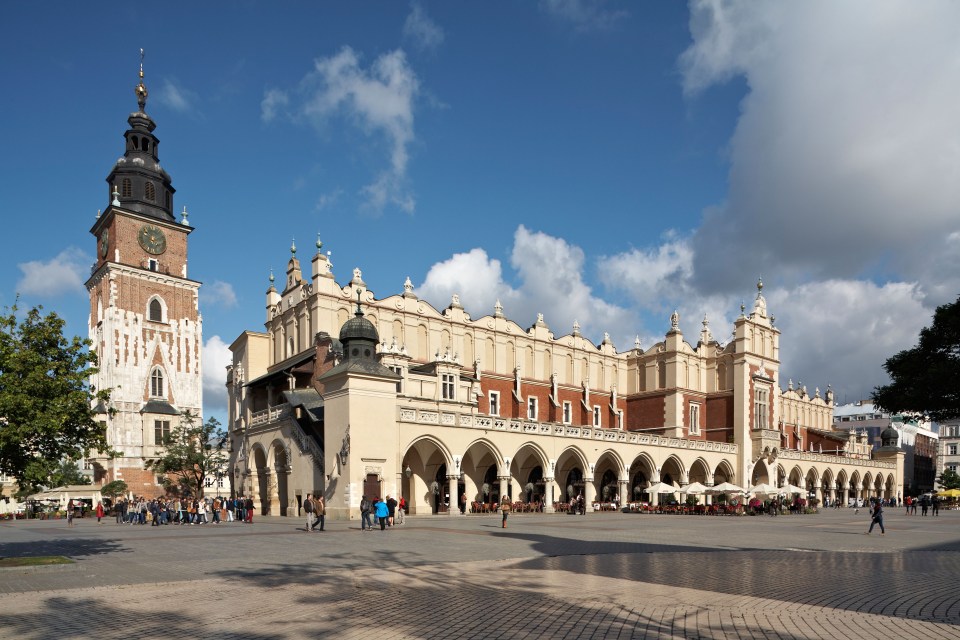 Krakow's Main Market Square with the Town Hall Tower and Cloth Hall.