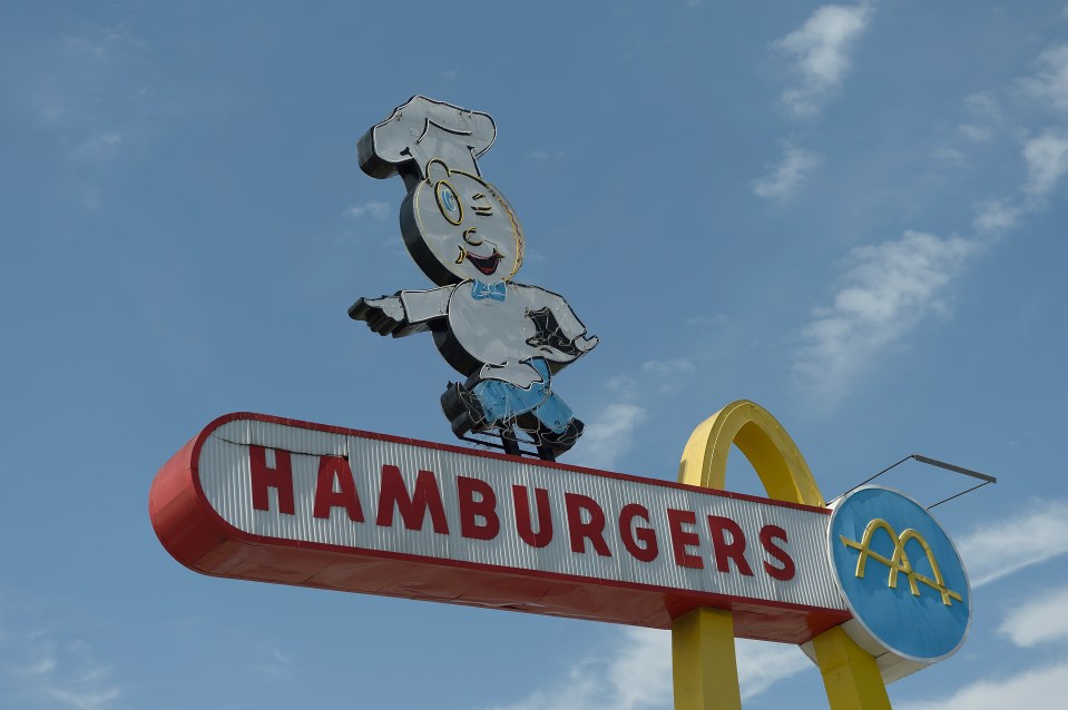 Photo of a vintage McDonald's sign featuring Speedee and the words "Hamburgers."