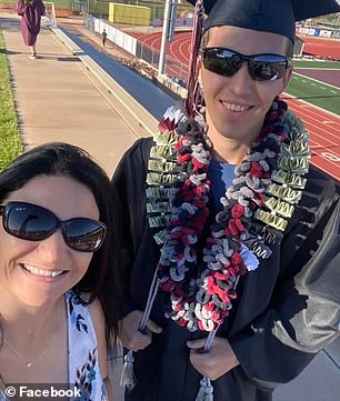 Tyler Robinson celebrates his graduation with his mother