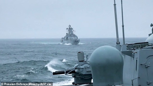 Stills from a video shared by the Russian defence ministry showing Russian armed forces participating in the Zapad 2025 drills