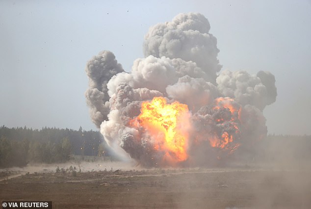 An explosion is seen at the Obuz-Lesnovsky training ground, Belarus September 12, 2021