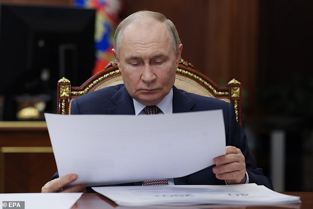 Russian President Vladimir Putin meets with Director General of the Agency for Strategic Initiatives (ASI) Svetlana Chupsheva, at the Kremlin in Moscow, September 11