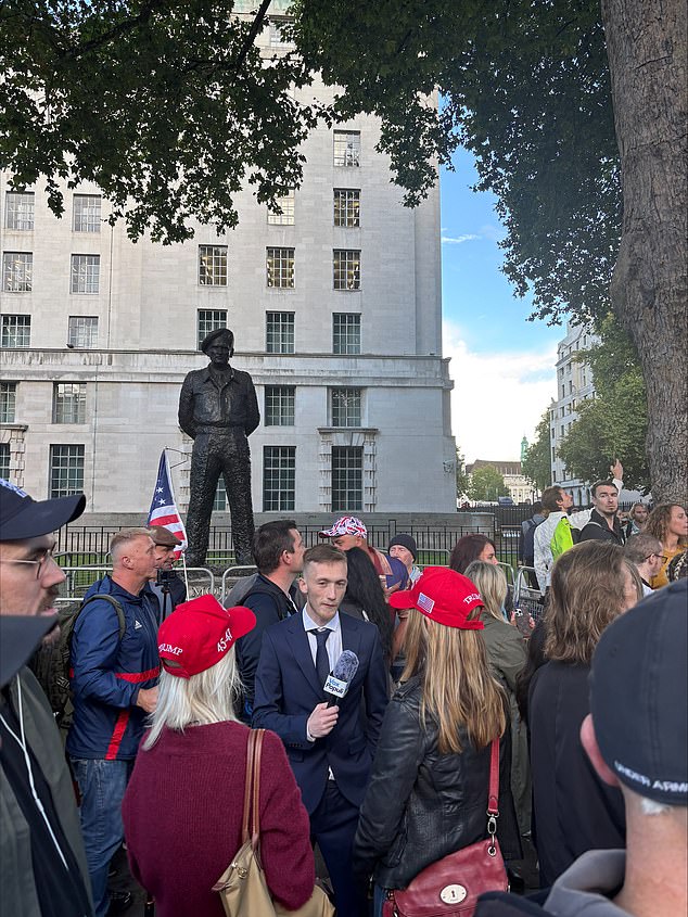 Supporters were seen wearing MAGA hats and holding American flags
