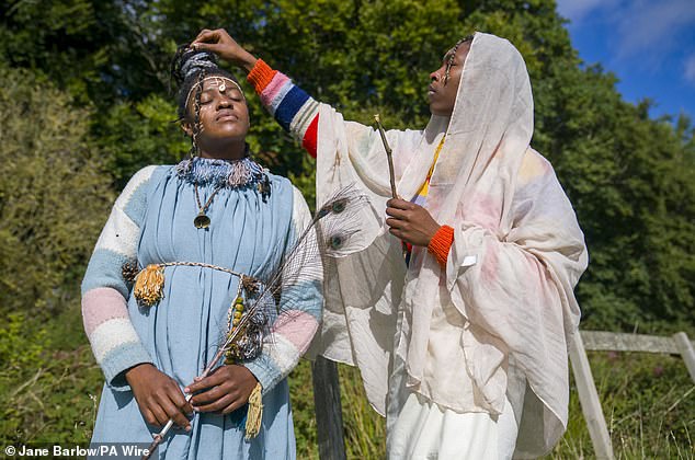Queen Nandi and handmaiden Asnat at the wooded campsite