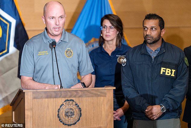 At a press conference, FBI director Kash Patel (right) remained silent while Utah Governor Spencer Cox urged the public to help identify the suspect