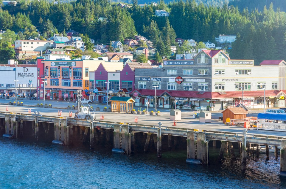 Alaskan waterfront with shops and buildings.