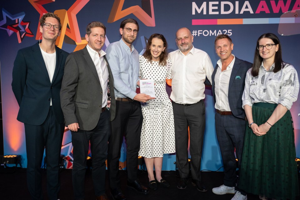 Team photo accepting an award for "Madeleine McCann: The Unseen Evidence."