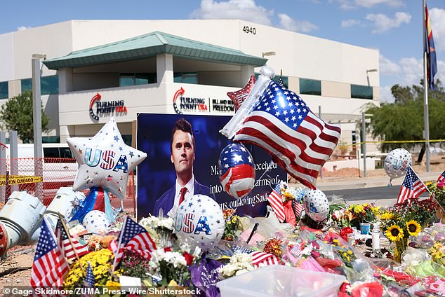 A memorial for Charlie Kirk is displayed outside the headquarters of Turning Point USA in Phoenix