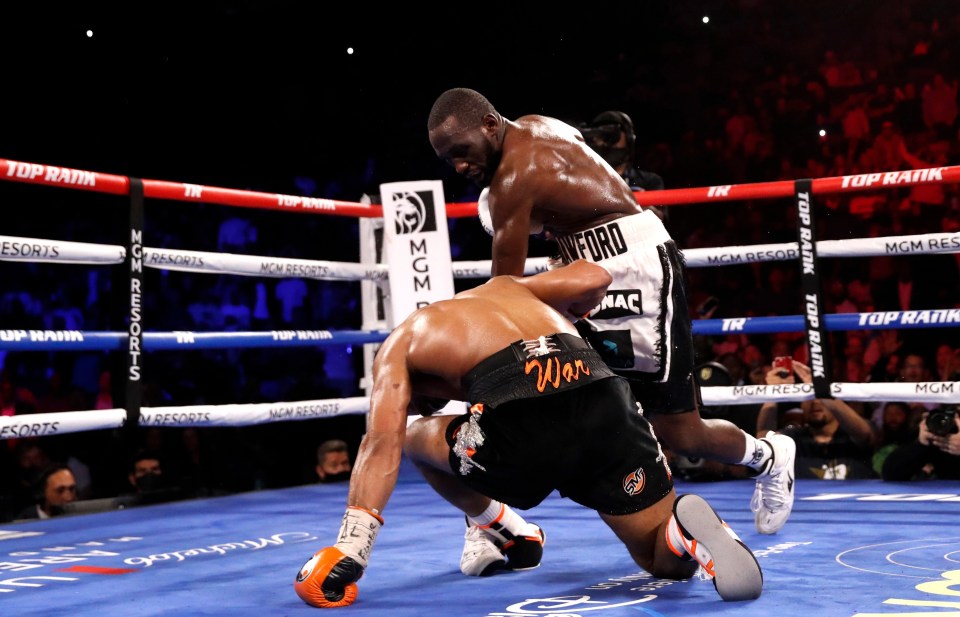 Terence Crawford knocking down Shawn Porter in a welterweight title fight.