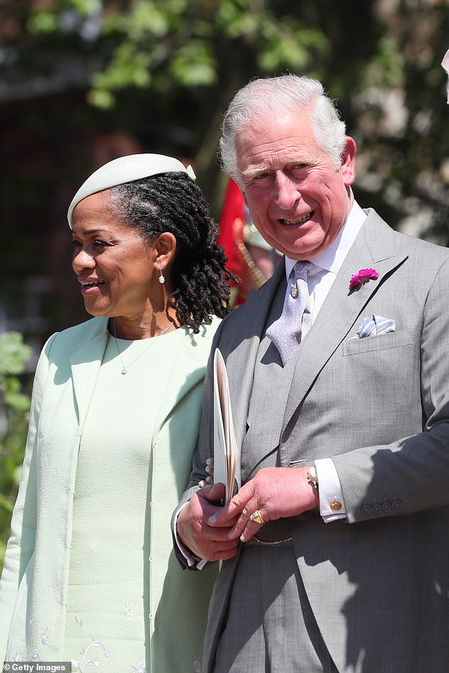 Doria Ragland and Prince Charles, Prince of Wales leave St George's Chapel at Windsor Castle following the wedding of Harry and Meghan