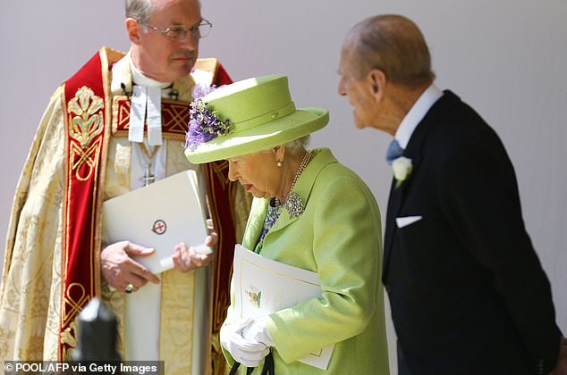 Queen Elizabeth II and Prince Philip, Duke of Edinburgh leave after attending the wedding ceremony