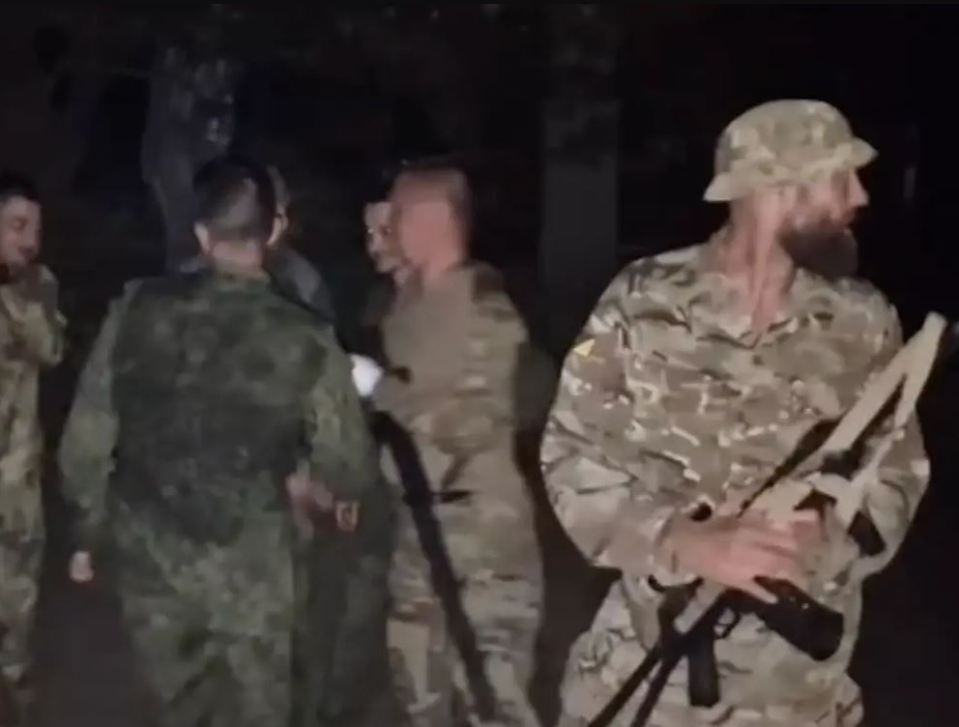 Ukrainian soldiers at night.