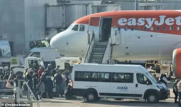 Passengers were seen disembarking from the plane following the incident this morning