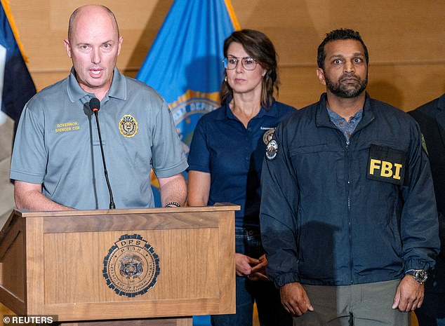 On Thursday night, authorities delivered a critical update in the manhunt for the assassin - all while Patel remained stone-faced (pictured)