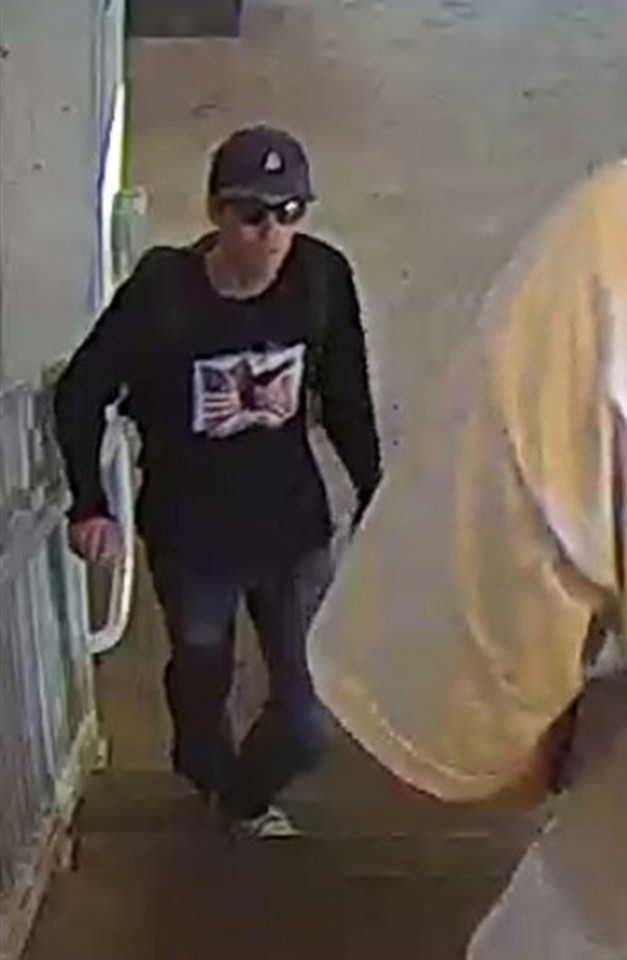 Surveillance image of person of interest in Charlie Kirk shooting.