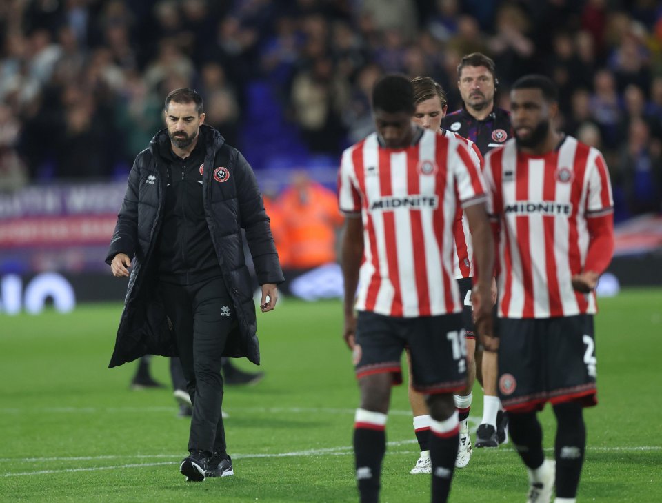 Ruben Selles, manager of Sheffield United, walking with his team after a match.