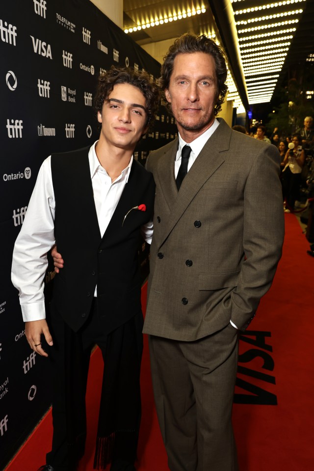 Matthew McConaughey and Levi McConaughey at a film premiere.