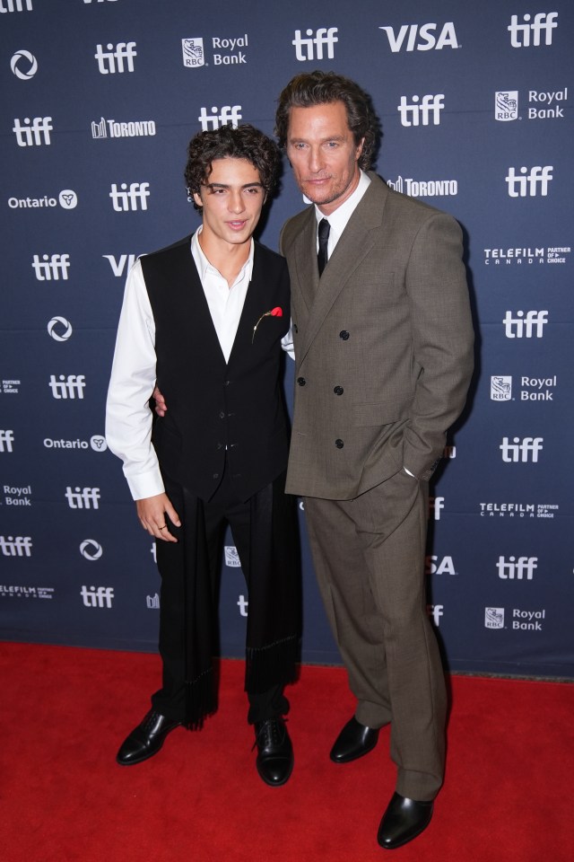 Matthew McConaughey and Levi McConaughey at a film premiere.