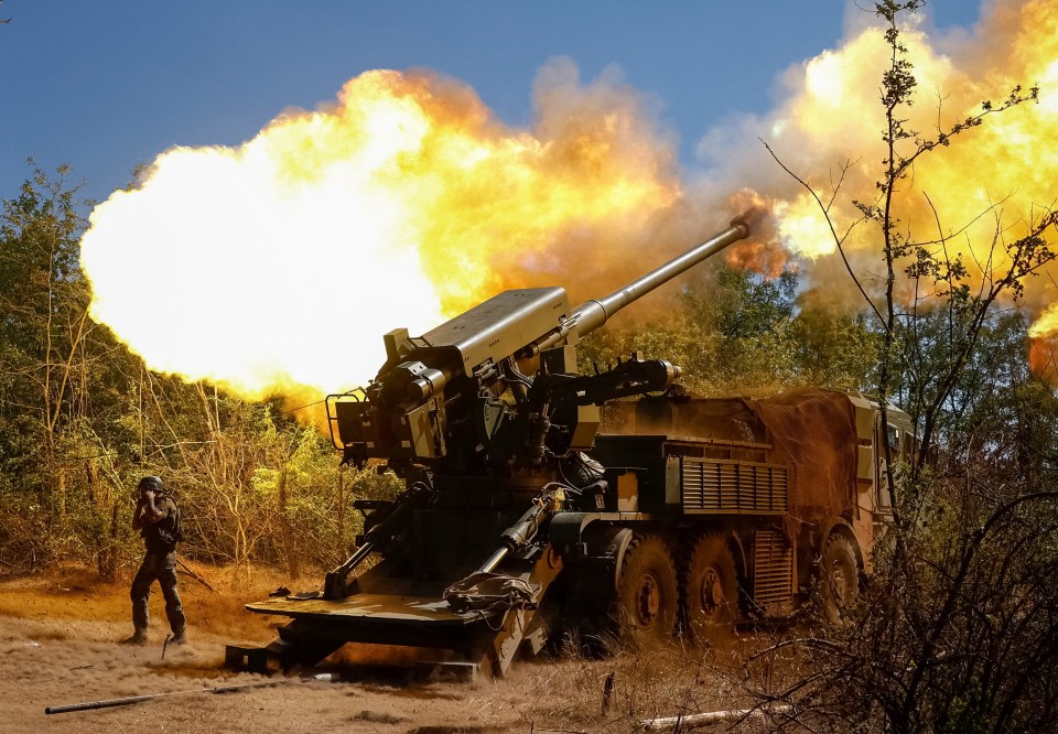 Ukrainian soldier firing a 2S22 Bohdana self-propelled howitzer.