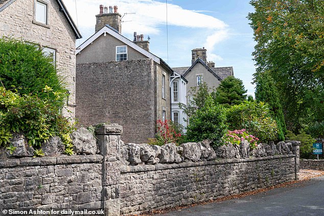 The six bedroom property which features the spite wall is currently listed for sale with a local estate agents