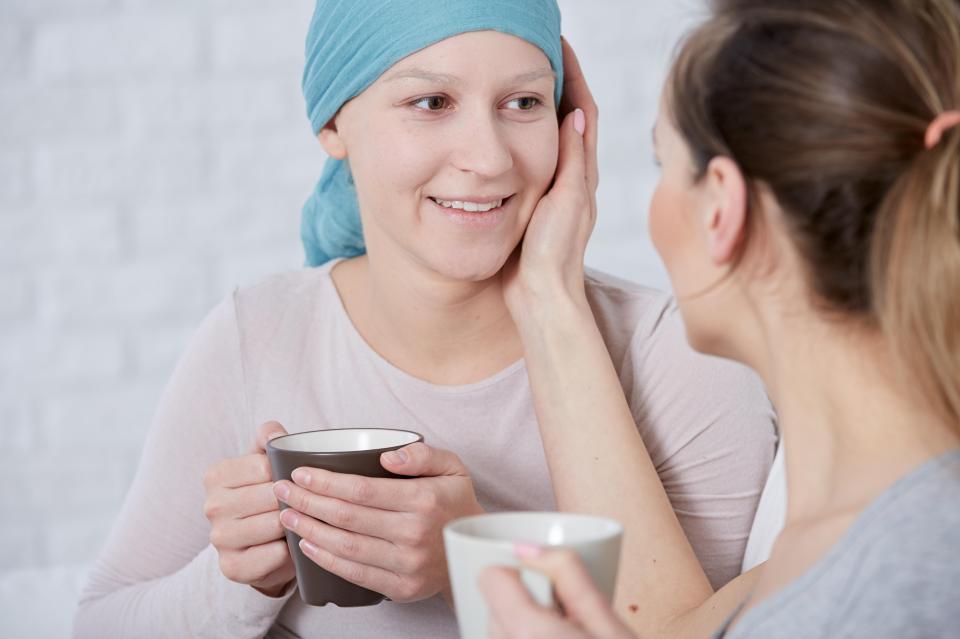 Woman supporting her ill sister.