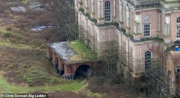 Vegetation is growing on parts of the building which remains unfinished 40 years after construction started